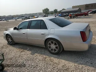 2004 Cadillac DeVille DTS z VIN 1G6KF57984U188454, wystawiony jako Copart lot #62397494 z przebiegiem 142 060 mil mil oraz Szkoda całkowita • Salvage title. Historia ofert i sprzedaży dostępna na DreamBid. Obrazek 2.
