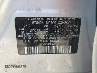 2018 Hyundai Accent SE z VIN 3KPC24A31JE013744, wystawiony jako Copart lot #52619315 z przebiegiem 89 887 mil mil oraz Szkoda całkowita • Salvage title. Historia ofert i sprzedaży dostępna na DreamBid. Obrazek 13.
