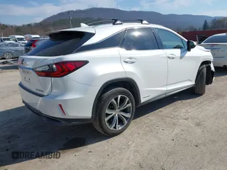 2016 Lexus RX 450h with VIN 2T2BGMCAXGC004844, listed as a IAAI auction lot 41791066 with 100,604 mi miles and . Bid and sale history available at DreamBid. Image 4.