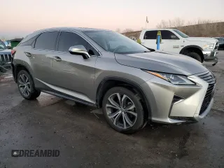 2017 Lexus RX 350 with VIN 2T2BZMCA8HC088173, listed as a Copart auction lot 83321354 with 113,988 mi miles and Salvage Title. Bid and sale history available at DreamBid. Image 4.