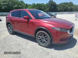 2018 Mazda CX-5 Grand Touring with VIN JM3KFBDM6J0472664, listed as a Copart auction lot 66394465 with 52,016 mi miles and Clean title. Bid and sale history available at DreamBid. Image 4.