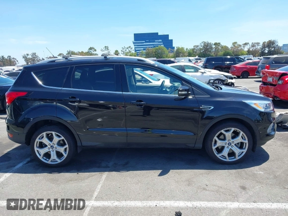 2019 Ford Escape Titanium with VIN 1FMCU9J98KUA21480, listed as a IAAI auction lot 42698275 with 65,478 mi miles and . Bid and sale history available at DreamBid. Image 13.