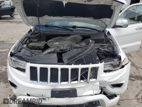 2015 Jeep Grand Cherokee Overland with VIN 1C4RJFCGXFC891616, listed as a Copart auction lot 61386065 with 90,011 mi miles and Salvage title. Bid and sale history available at DreamBid. Image 12.