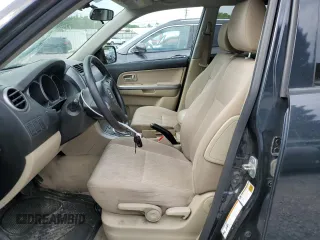 2013 Suzuki Grand Vitara Premium z VIN JS3TD0D65D4100272, wystawiony jako Copart lot #65140134 z przebiegiem 108 261 mil mil oraz Szkoda całkowita • Salvage title. Historia ofert i sprzedaży dostępna na DreamBid. Obrazek 7.
