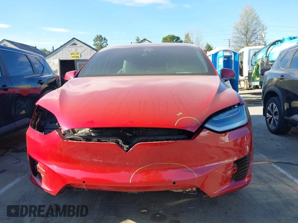 2020 Tesla Model X Long Range with VIN 5YJXCDE22LF217014, listed as a IAAI auction lot 41845824 with 149,375 mi miles and . Bid and sale history available at DreamBid. Image 13.