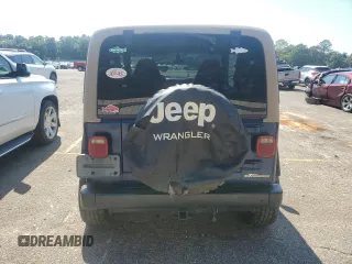 2002 Jeep Wrangler X with VIN 1J4FA39S32P735671, listed as a Copart auction lot 68236084 with 137,587 mi miles and Salvage Title. Bid and sale history available at carsss.com. Image 6.