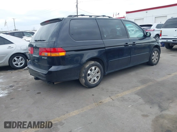 2004 Honda Odyssey EX-L with VIN 5FNRL18914B037976, listed as a IAAI auction lot 41893438 with Not Provided miles and . Bid and sale history available at DreamBid. Image 4.