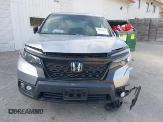 2020 Honda Passport EX-L z VIN 5FNYF8H55LB011307, wystawiony jako IAAI lot #40880877 z przebiegiem 32 509 mil mil oraz . Historia ofert i sprzedaży dostępna na DreamBid. Obrazek 12.