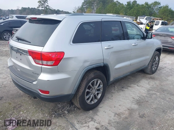 2012 Jeep Grand Cherokee Laredo with VIN 1C4RJFAG7CC189381, listed as a IAAI auction lot 41429085 with 137,238 mi miles. Bid and sale history available at carsss.com. Image 4.