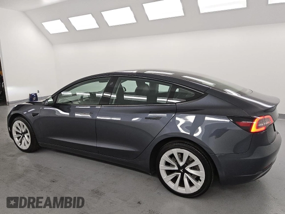 2023 Tesla Model 3 z VIN 5YJ3E1EA3PF459640, wystawiony jako Copart lot #61107195 z przebiegiem 141 027 mil mil oraz Czysty tytuł • Clean title. Historia ofert i sprzedaży dostępna na DreamBid. Obrazek 2.