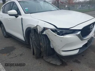 2017 Mazda CX-5 Touring with VIN JM3KFACL5H0189296, listed as a IAAI auction lot 42042328 with 60,208 mi miles and . Bid and sale history available at carsss.com. Image 6.