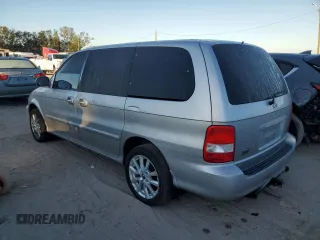 2004 Kia Sedona LX with VIN KNDUP131046591151, listed as a Copart auction lot 82201894 with 147,194 mi miles and Salvage Title. Bid and sale history available at carsss.com. Image 2.