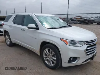2021 Chevrolet Traverse High Country z VIN 1GNEVNKW9MJ215972, wystawiony jako IAAI lot #42566770 z przebiegiem 88 878 mil mil oraz . Historia ofert i sprzedaży dostępna na DreamBid. Obrazek 1.