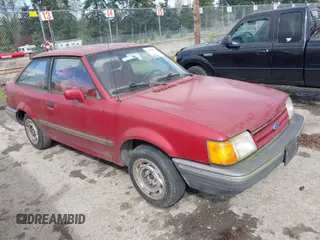 1989 Ford Escort z VIN 1FAPP9194KW249161, wystawiony jako IAAI lot #41988003 z przebiegiem 75 974 mil mil oraz . Historia ofert i sprzedaży dostępna na DreamBid. Obrazek 1.