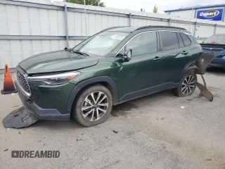 2023 Toyota Corolla Cross XLE with VIN 7MUDAAAG4PV038098, listed as a Copart auction lot 57906915 with 73,569 mi miles and Salvage title. Bid and sale history available at DreamBid. Image 1.
