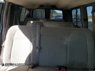 2013 Chevrolet Express Passenger 1LT z VIN 1GAZGYFG5D1190358, wystawiony jako Copart lot #75496574 z przebiegiem 114 340 mil mil oraz Szkoda całkowita • Salvage title. Historia ofert i sprzedaży dostępna na DreamBid. Obrazek 10.