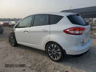 2017 Ford C-Max Energi Titanium with VIN 1FADP5FU3HL100162, listed as a Copart auction lot 62910724 with 68,736 mi miles and Salvage Title. Bid and sale history available at carsss.com. Image 2.