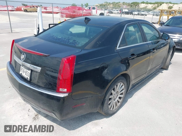 2013 Cadillac CTS Luxury with VIN 1G6DE5E50D0101763, listed as a IAAI auction lot 42090577 with 105,097 mi miles and . Bid and sale history available at DreamBid. Image 4.