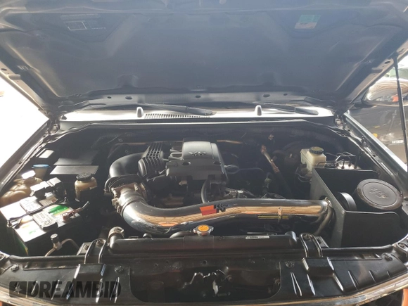 2007 Nissan Frontier Nismo with VIN 1N6AD06W57C439818, listed as a Copart auction lot 61210285 with 174,708 mi miles and Salvage title. Bid and sale history available at DreamBid. Image 11.