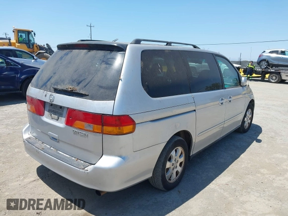 2004 Honda Odyssey EX z VIN 5FNRL18624B007438, wystawiony jako IAAI lot #42441043 z przebiegiem 208 480 mil mil oraz . Historia ofert i sprzedaży dostępna na DreamBid. Obrazek 4.