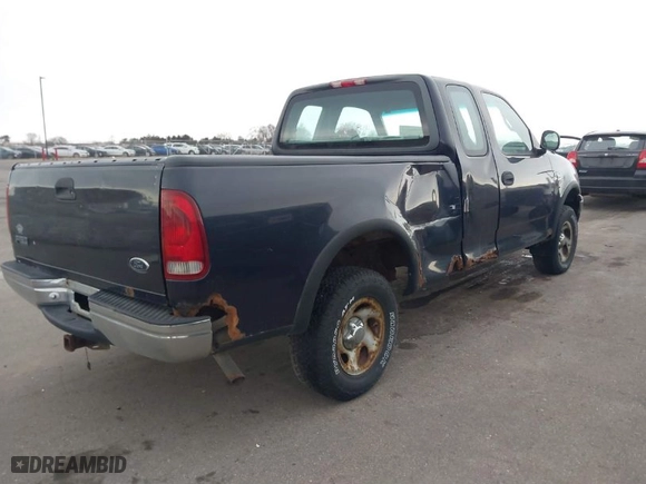 1999 Ford F-150 Work Series with VIN 1FTRX18W2XNA90069, listed as a IAAI auction lot 41496543 with 115,787 mi miles. Bid and sale history available at carsss.com. Image 4.