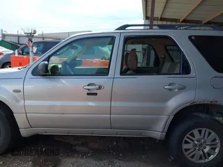 2006 Mercury Mariner Convenience with VIN 4M2YU56Z86KJ12563, listed as a IAAI auction lot 41817401 with 152,156 mi miles and . Bid and sale history available at DreamBid. Image 14.