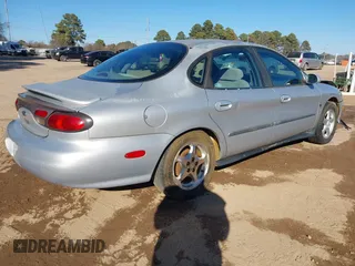 1999 Ford Taurus SE with VIN 1FAFP53S6XA322930, listed as a IAAI auction lot 41422655 with 189,696 mi miles. Bid and sale history available at carsss.com. Image 4.
