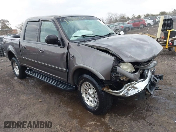 2003 Ford F-150 XLT with VIN 1FTRW086X3KA54557, listed as a IAAI auction lot 41888037 with 217,512 mi miles. Bid and sale history available at carsss.com. Image 1.
