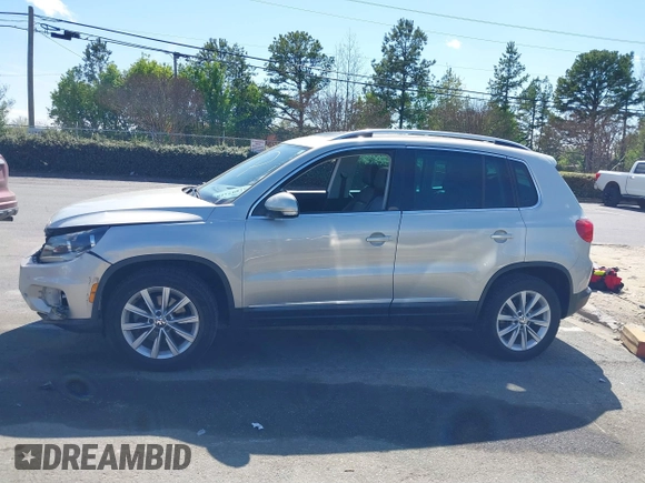 2015 Volkswagen Tiguan SE with VIN WVGAV7AX0FW544218, listed as a IAAI auction lot 41897418 with 97,235 mi miles and . Bid and sale history available at DreamBid. Image 15.
