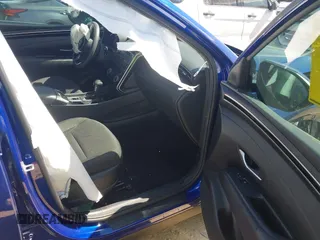 2022 Hyundai Tucson SEL with VIN 5NMJB3AE3NH059349, listed as a IAAI auction lot 42330576 with 27,010 mi miles and . Bid and sale history available at DreamBid. Image 5.