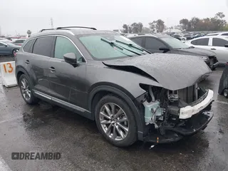 2019 Mazda CX-9 Grand Touring with VIN JM3TCADY4K0315095, listed as a IAAI auction lot 41573317 with 64,635 mi miles. Bid and sale history available at carsss.com. Image 1.