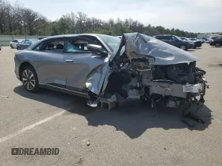 2023 Lucid Air Pure z VIN 50EA1PFA8PA007207, wystawiony jako Copart lot #61214904 z przebiegiem 2958 mil mil oraz Szkody całkowita. Historia ofert i sprzedaży dostępna na DreamBid. Obrazek 4.
