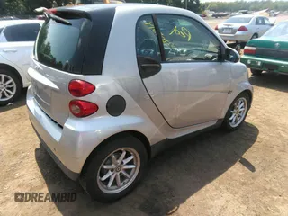 2008 Smart fortwo Pure with VIN WMEEJ31X88K162198, listed as a IAAI auction lot 42809814 with 75,630 mi miles and . Bid and sale history available at DreamBid. Image 4.