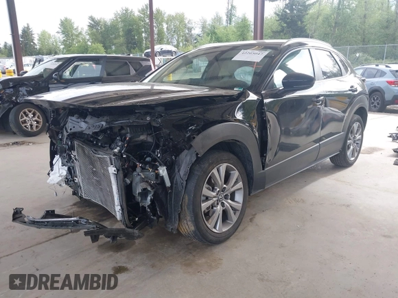 2023 Mazda CX-30 S Carbon Edition with VIN 3MVDMBCMXPM520776, listed as a IAAI auction lot 42205047 with Not provided miles and . Bid and sale history available at DreamBid. Image 18.