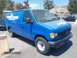 2003 Ford Econoline Cargo with VIN 1FTNE24223HA50404, listed as a IAAI auction lot 42087224 with 210,418 mi miles. Bid and sale history available at carsss.com. Image 1.