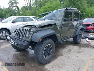 2016 Jeep Wrangler Unlimited Sport with VIN 1C4BJWDG3GL140326, listed as a IAAI auction lot 42385929 with 92,428 mi miles and . Bid and sale history available at DreamBid. Image 2.