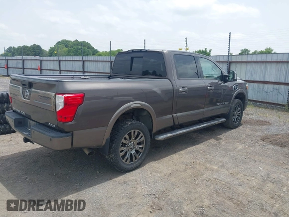 2016 Nissan Titan SL z VIN 1N6BA1F48GN510113, wystawiony jako IAAI lot #42252271 z przebiegiem 58 691 mil mil oraz . Historia ofert i sprzedaży dostępna na DreamBid. Obrazek 4.