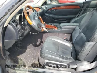 2004 Lexus SC 430 z VIN JTHFN48Y040058272, wystawiony jako Copart lot #55596645 z przebiegiem 179 363 mil mil oraz Tytuł czysty. Historia ofert i sprzedaży dostępna na DreamBid. Obrazek 7.