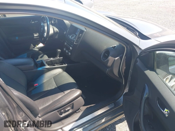 2014 Nissan Maxima SV with VIN 1N4AA5AP1EC458409, listed as a IAAI auction lot 42056758 with 103,570 mi miles and . Bid and sale history available at DreamBid. Image 5.