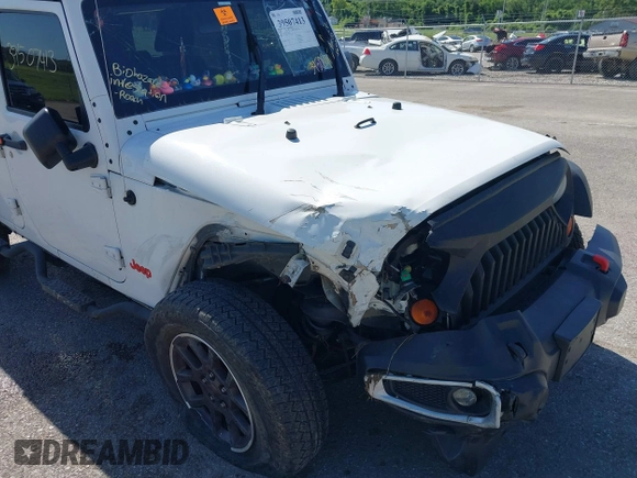 2013 Jeep Wrangler Unlimited Sport with VIN 1C4BJWDG4DL697208, listed as a IAAI auction lot 39507413 with 177,125 mi miles and . Bid and sale history available at DreamBid. Image 6.