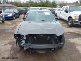 2014 Dodge Charger SE with VIN 2C3CDXBG8EH357664, listed as a IAAI auction lot 41860609 with 94,918 mi miles. Bid and sale history available at carsss.com. Image 12.