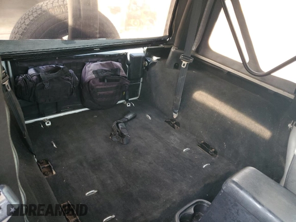 2004 Jeep Wrangler X with VIN 1J4FA39S74P763492, listed as a Copart auction lot 54664095 with 168,493 mi miles and Salvage Title. Bid and sale history available at DreamBid. Image 11.