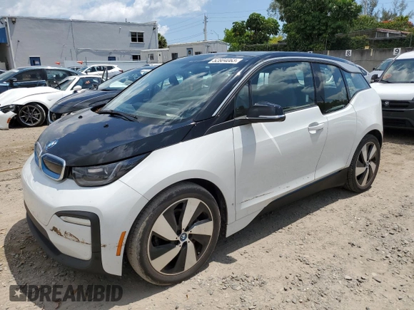 2018 BMW i3 with VIN WBY7Z4C54JVD96989, listed as a Copart auction lot 52804063 with 50,865 mi miles. Bid and sale history available at carsss.com. Image 1.