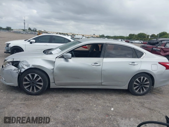 2017 Nissan Altima SV with VIN 1N4AL3AP7HC188945, listed as a IAAI auction lot 42111225 with 157,185 mi miles and . Bid and sale history available at carsss.com. Image 14.