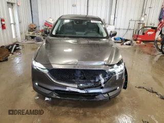 2021 Mazda CX-5 Grand Touring with VIN JM3KFBDM6M0478372, listed as a Copart auction lot 43797295 with 31,763 mi miles and Salvage Title. Bid and sale history available at carsss.com. Image 5.