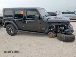 2020 Jeep Wrangler Unlimited Rubicon with VIN 1C4HJXFG9LW101973, listed as a Copart auction lot 60261365 with 61,097 mi miles and Clean title. Bid and sale history available at DreamBid. Image 4.