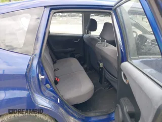 2009 Honda Fit with VIN JHMGE882X9S058976, listed as a IAAI auction lot 42202305 with 121,633 mi miles and . Bid and sale history available at DreamBid. Image 8.