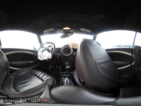 2013 MINI Convertible S with VIN WMWZP3C54DT297304, listed as a IAAI auction lot 41377572 with 101,991 mi miles and . Bid and sale history available at DreamBid. Image 18.