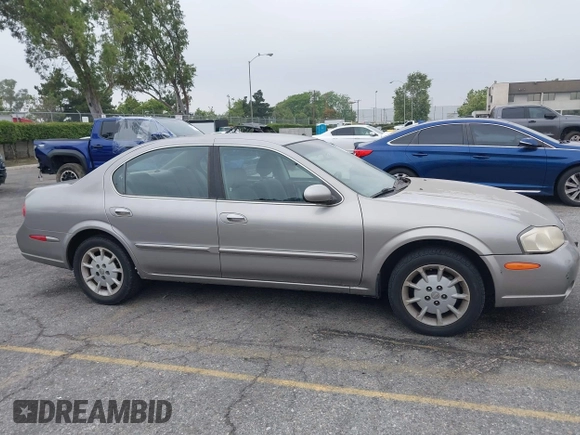 2000 Nissan Maxima GXE z VIN JN1CA31D0YT754624, wystawiony jako IAAI lot #42299290 z przebiegiem 81 958 mil mil oraz . Historia ofert i sprzedaży dostępna na DreamBid. Obrazek 13.