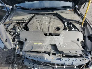2019 Infiniti Q50 Luxe z VIN JN1EV7AR4KM592160, wystawiony jako Copart lot #52299965 z przebiegiem 99 645 mil mil oraz Czysty tytuł • Clean title. Historia ofert i sprzedaży dostępna na DreamBid. Obrazek 11.